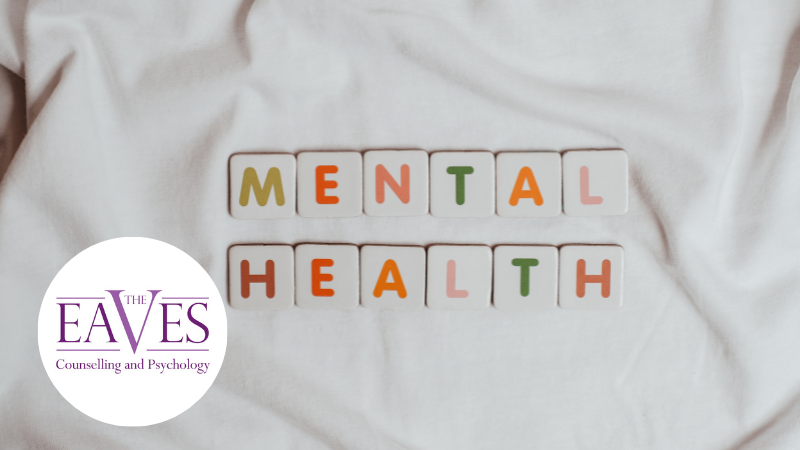 Colourful tiles spelling “Mental Health” on a white background, symbolising awareness and wellbeing.