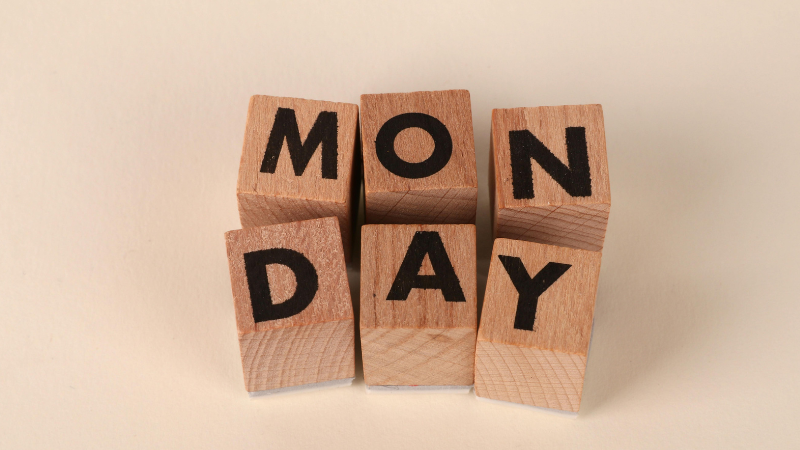 Wooden block letters spelling the word “Monday.”