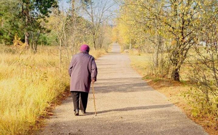 Elderly Lady Walking Alone