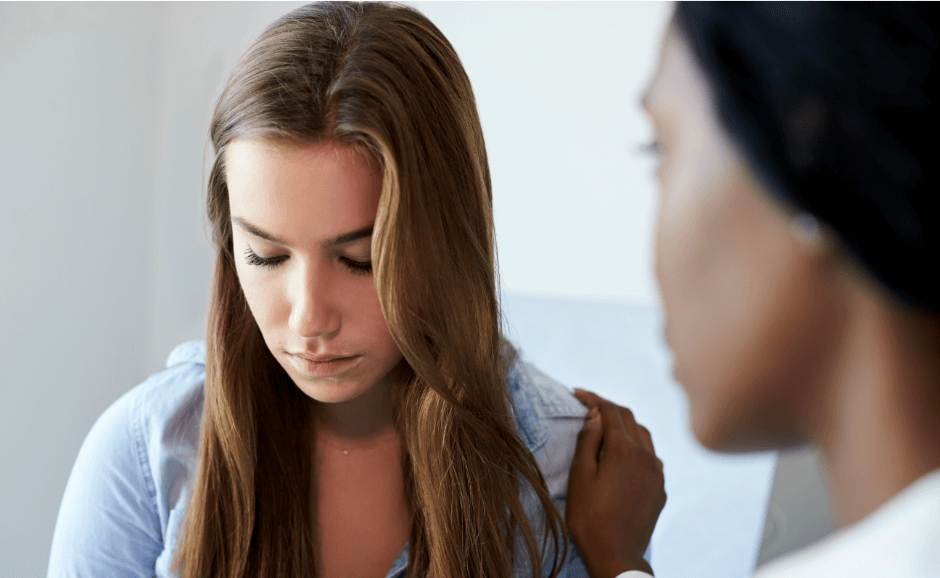 Upset Teenage Girl Receiving Therapy