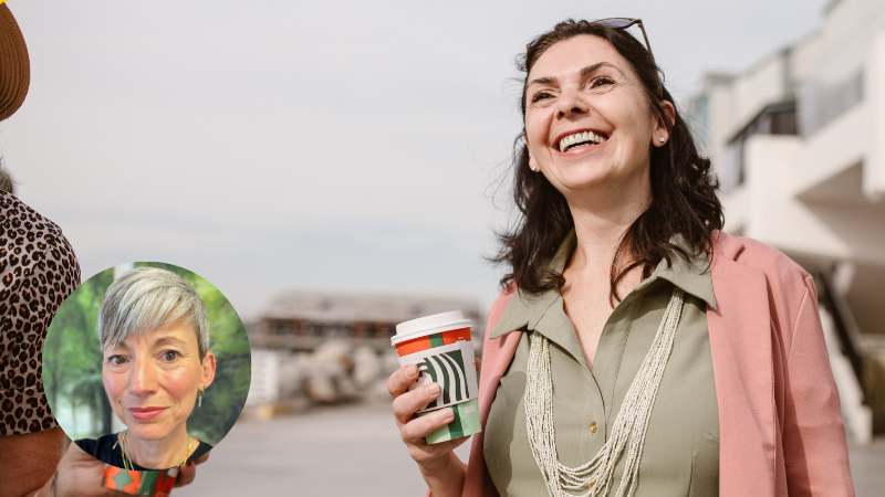Middle-aged brunette woman smiling while holding a coffee cup, representing menopause wellbeing and emotional support through counselling.