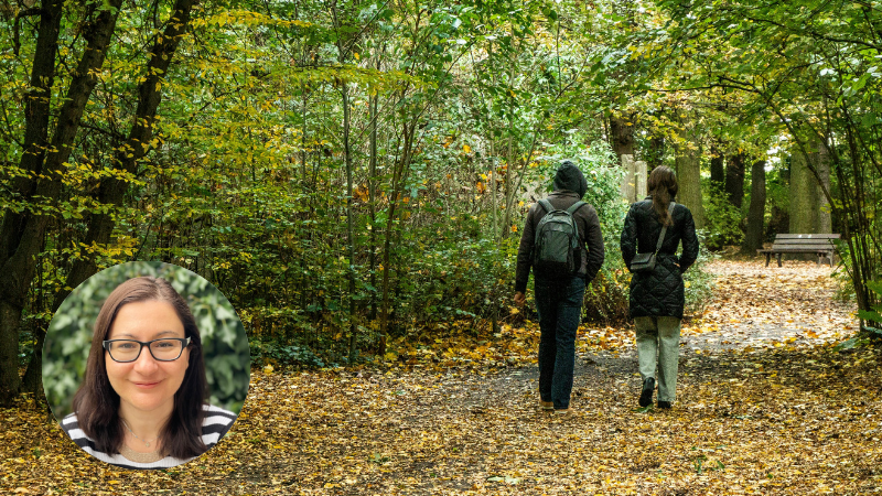 Two people walking together through autumn woods, symbolising living a full life with bipolar disorder