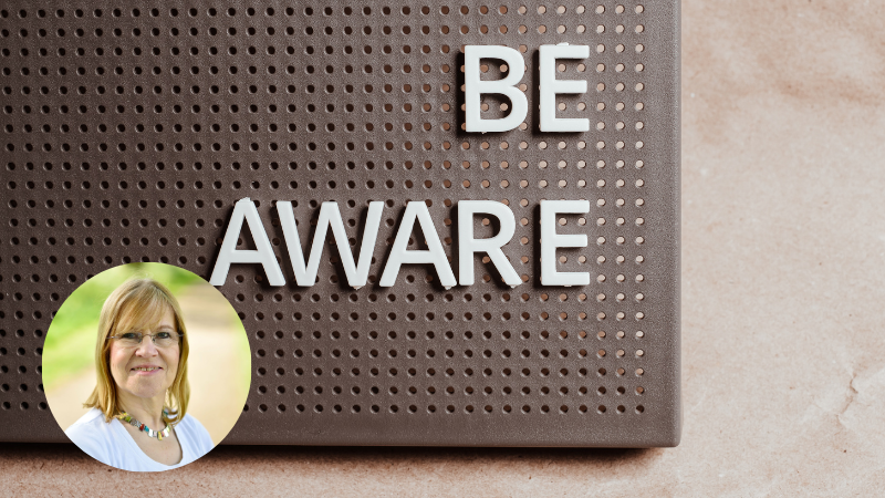 A sign displaying the words “Be Aware,” symbolising consent awareness, safeguarding and sexual abuse prevention.