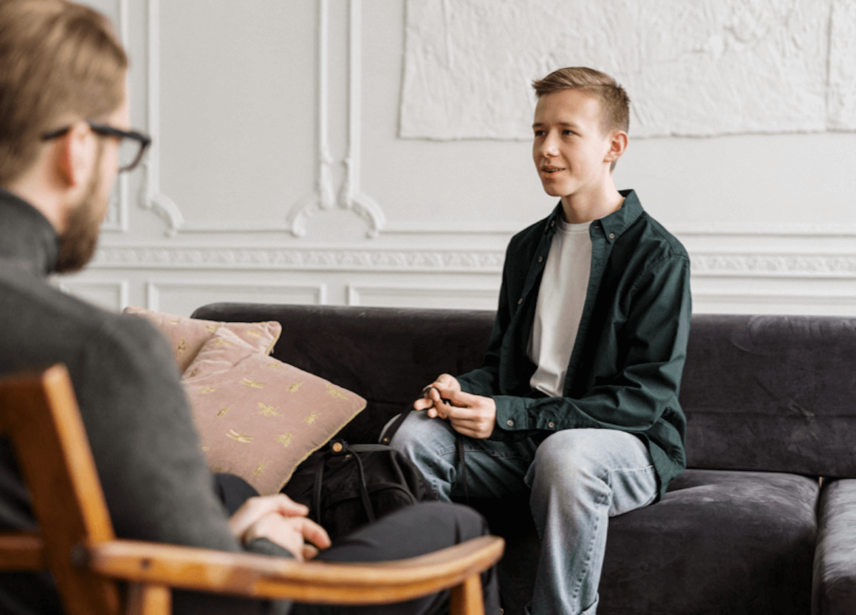Therapist Talking to Teenage Patient