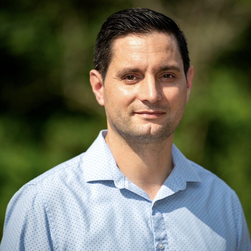 Professional headshot of a Humanistic and Integrative Counsellor and Psychotherapist specialising in trauma, abuse, PTSD, and complex disorders.