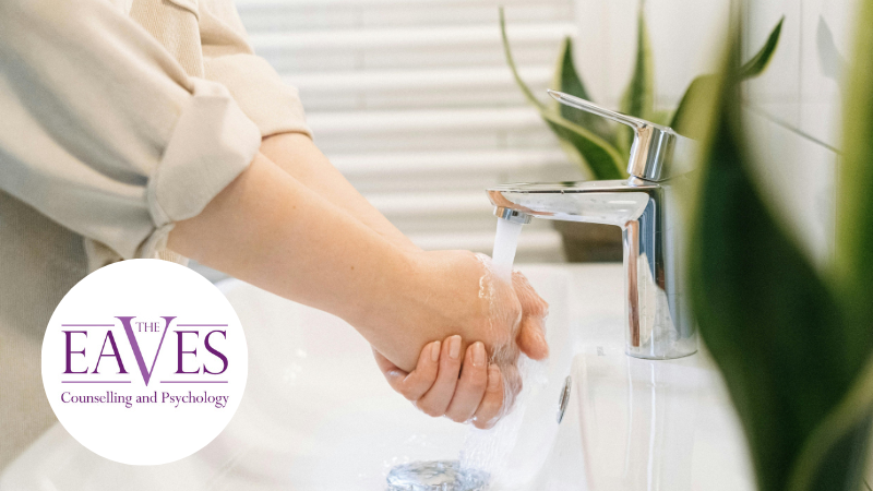 Person washing hands repeatedly under a tap, illustrating compulsive hand-washing associated with obsessive compulsive disorder (OCD).