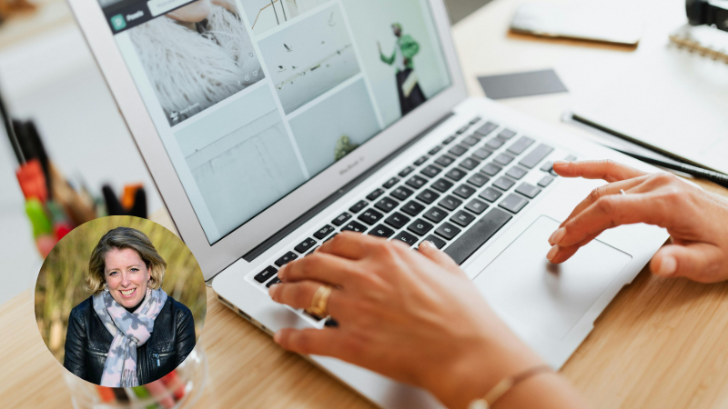 Hands typing on a MacBook at a desk with a pen holder, representing digital overload, multitasking and modern work stress.