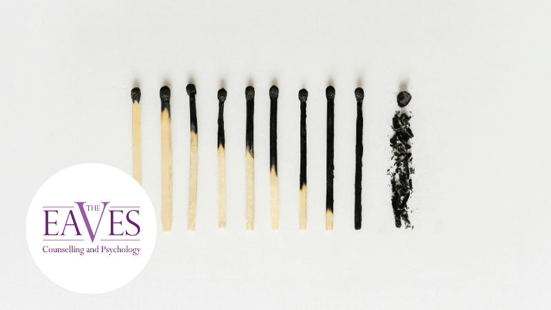Matchsticks lined up progressively burned, ending in ash, symbolising workplace stress, burnout and mental exhaustion.