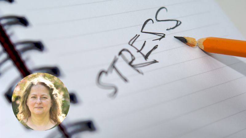 A stressed individual holding their head with a cluttered mind, symbolising the impact of stress on mental and physical health