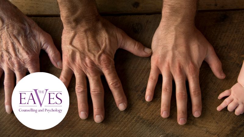 Three hands of different ages—a child, an adult, and an elderly person—rest on a wooden table. The Eaves Counselling and Psychology logo is in the lower left corner.