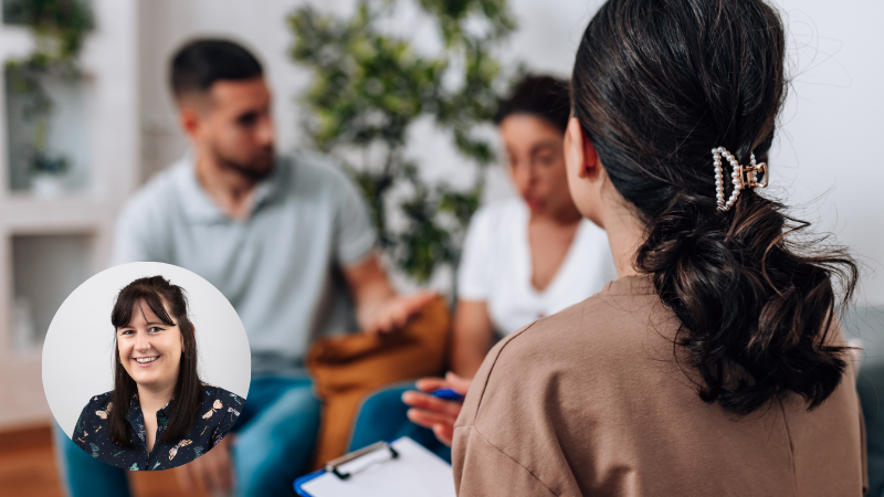 A couple in conversation with a therapist during a counselling session.