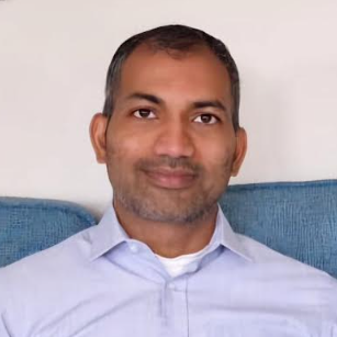 Portrait of Baskaran Savadamuthu, Cognitive Behavioural Therapist at The Eaves in Guildford.