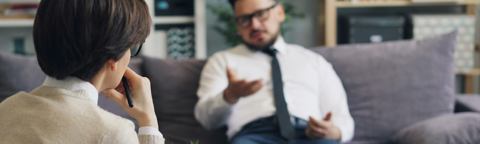 Therapist listening attentively to client during DBT therapy session