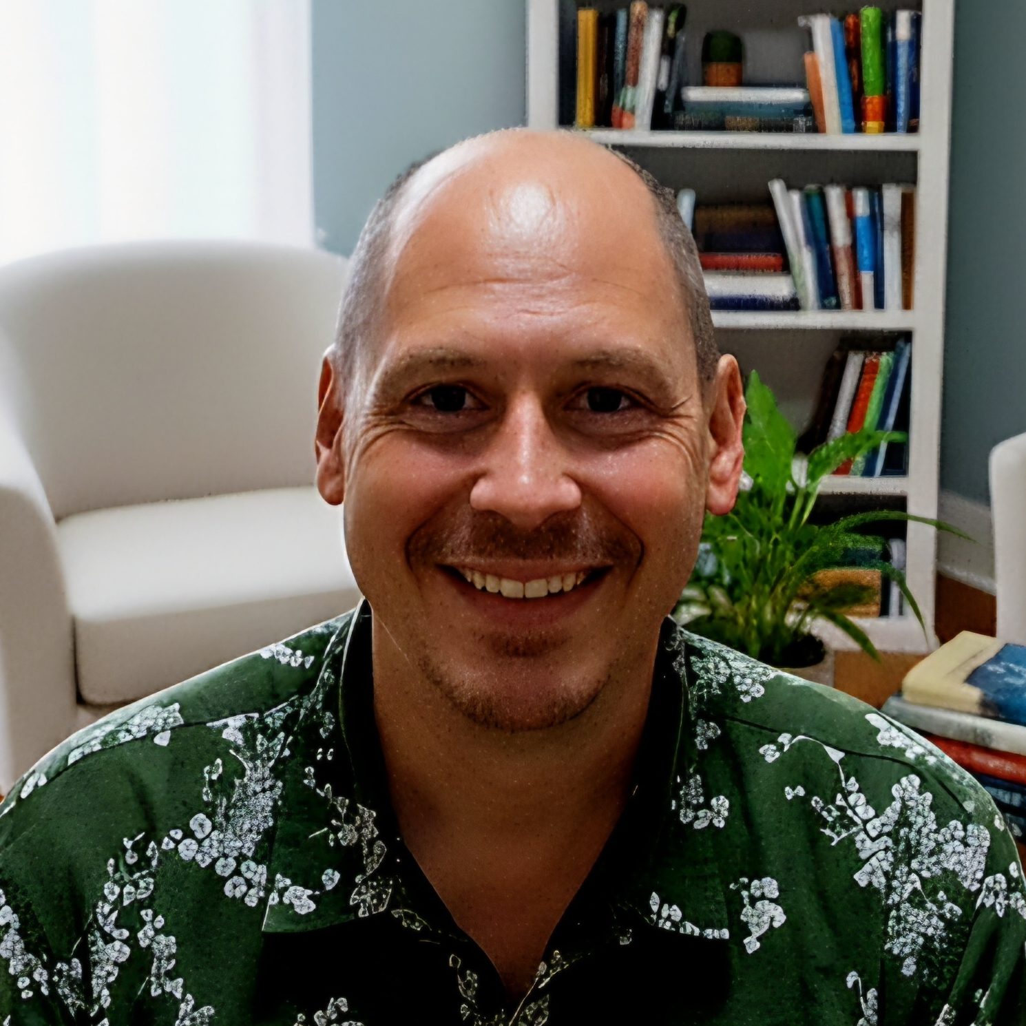 A compassionate counsellor smiling warmly in a calm, professional setting, reflecting empathy and approachability