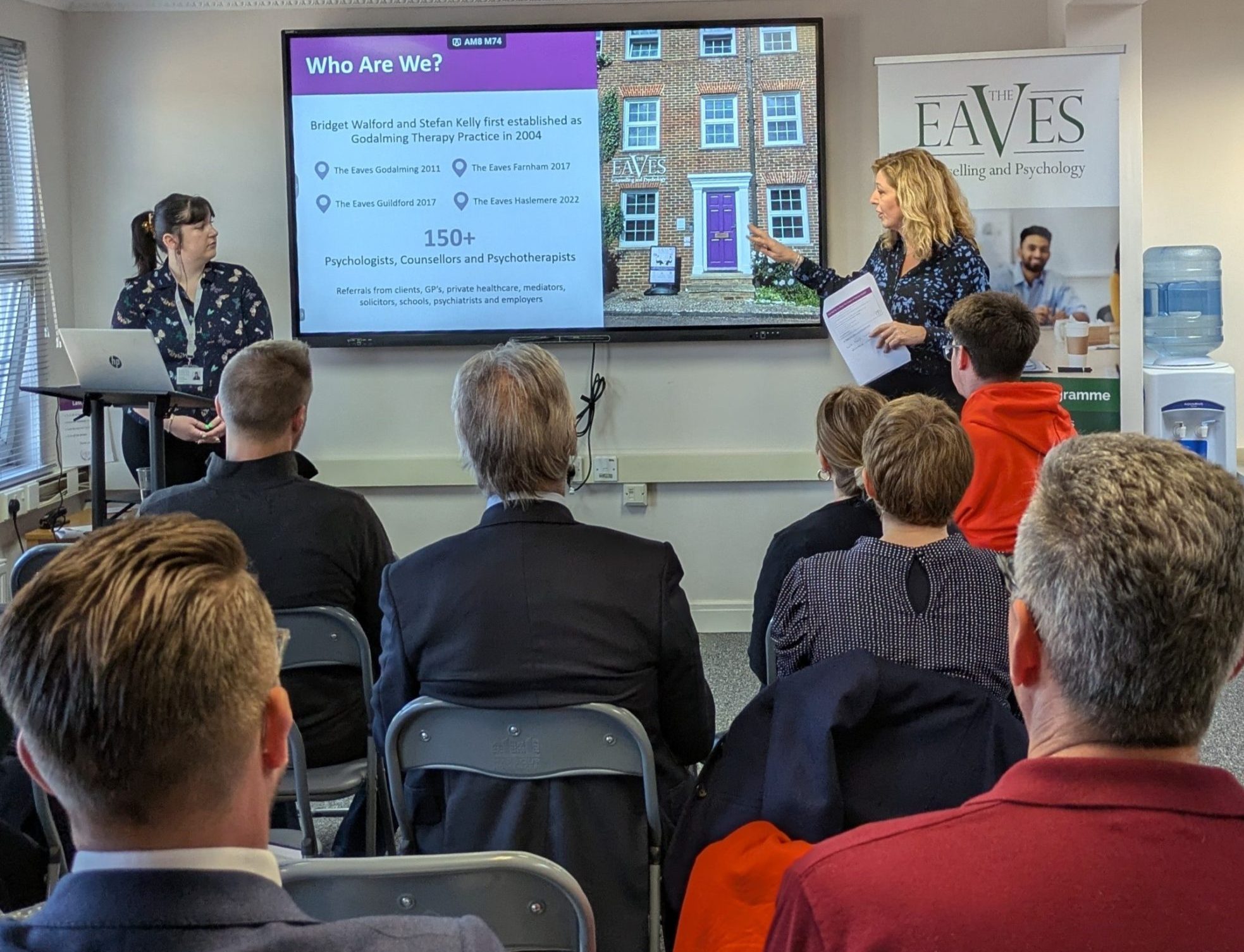 Team presenting a mental health workshop in The Eaves Counselling Farnham training suite available for hire