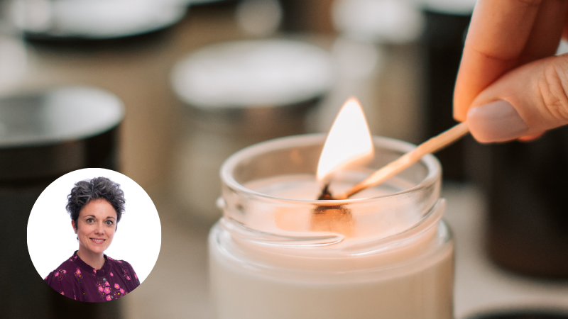 A woman lighting a white candle with a match, symbolising hope, calm and emotional healing with circle bottom left with the author of the blog