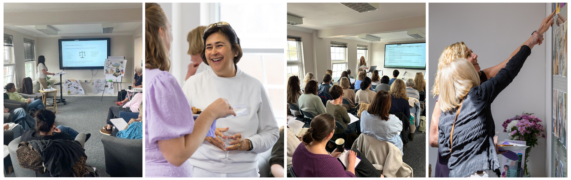 A smiling woman at a counselling supervision course networking event, with trainees attending CPD training and two women pointing at a notice board.
