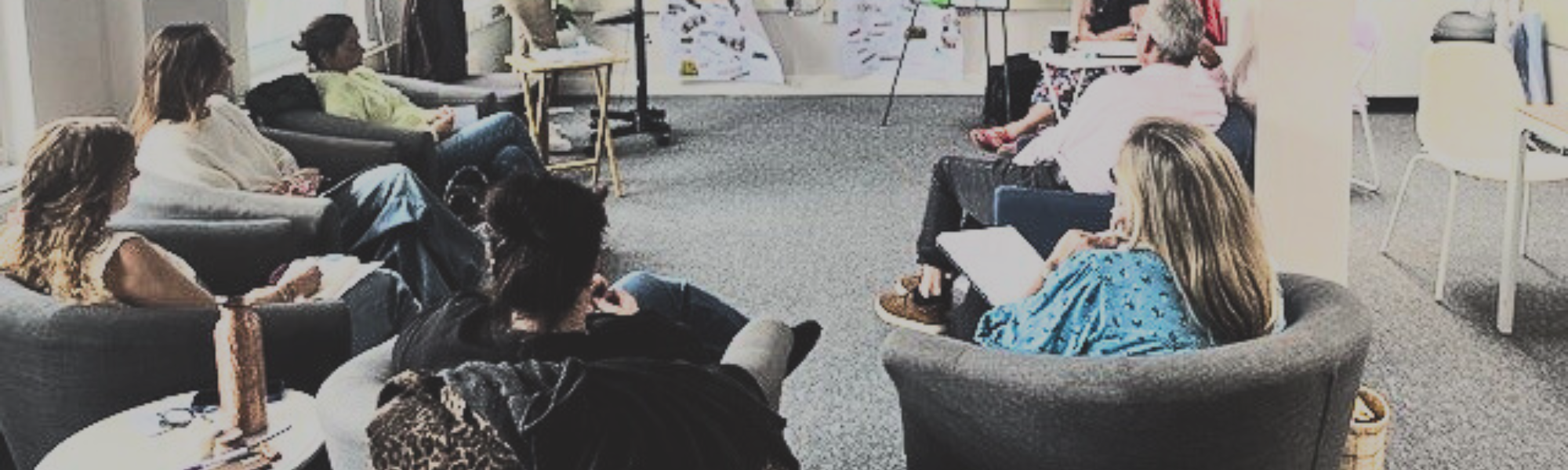 Counselling supervision session with therapists in a group reflecting on client work during professional training