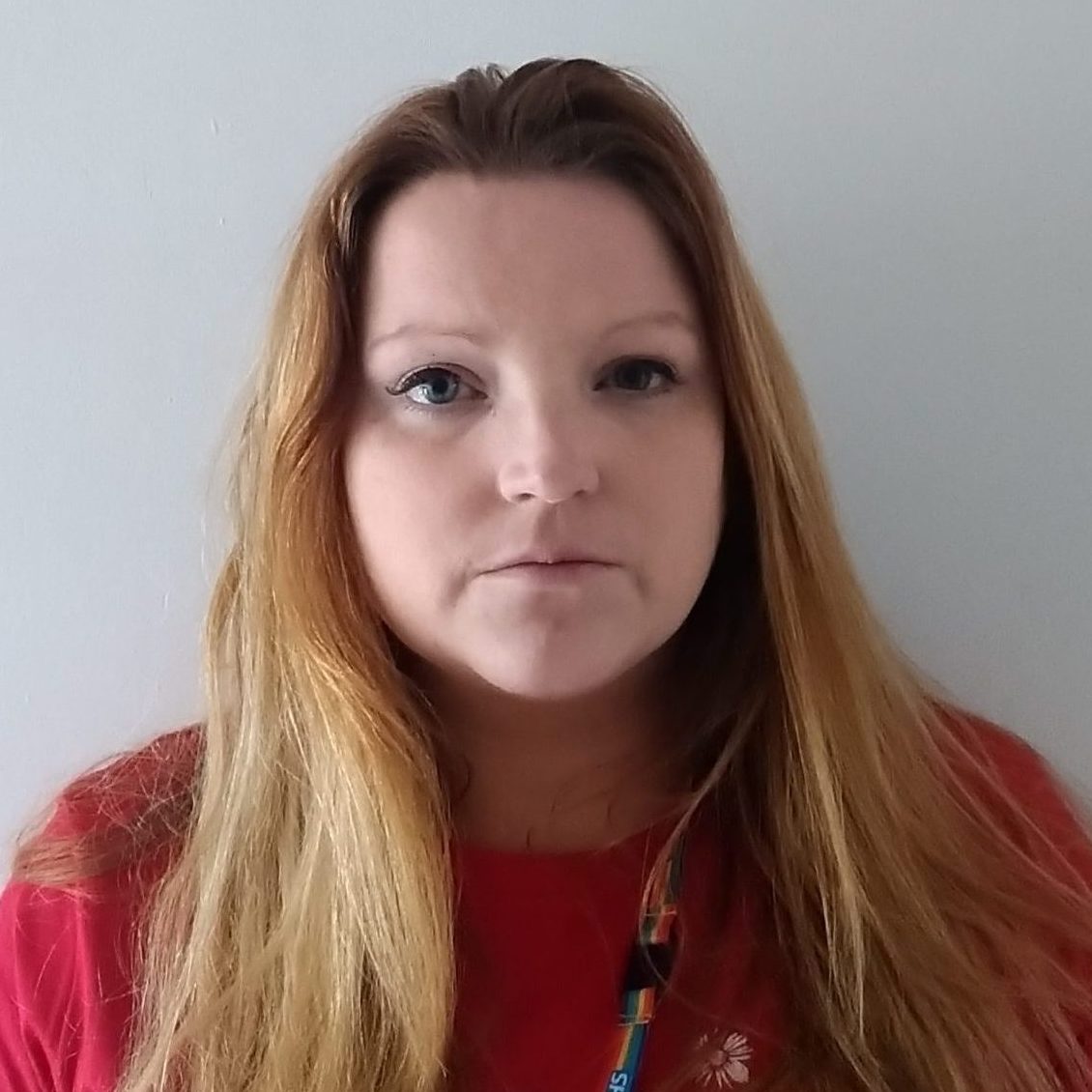 Professional headshot of an experienced CBT therapist with NHS and CAMHS background, specialising in neurodiversity and compassionate mental health support for all ages.