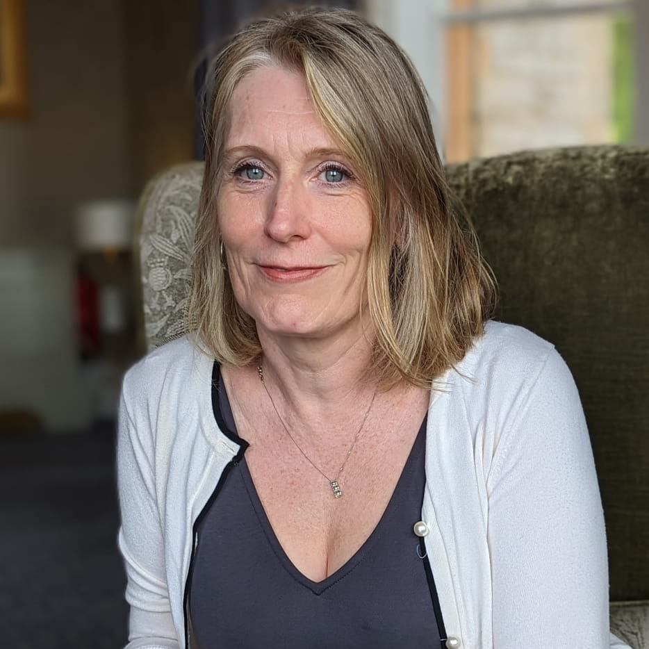 Portrait of an experienced psychotherapist offering individual and couples therapy in a supportive, confidential setting.