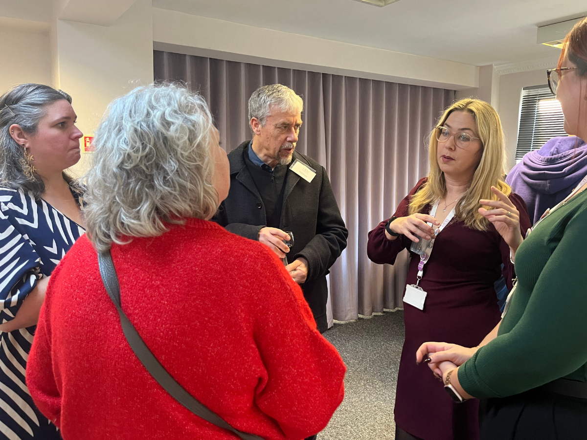 Group of therapists and affiliates networking in a circle during a Counselling CPD workshop at The Eaves