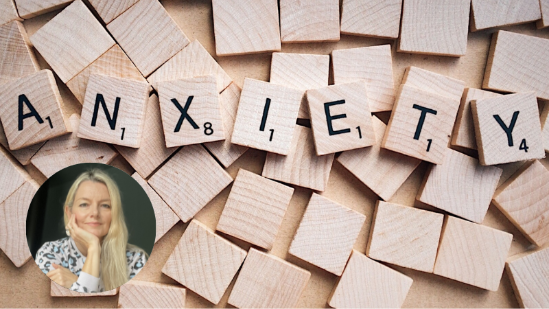 Scrabble tiles spelling “Anxiety” on wooden tiles with a circular portrait of the blog author of blog counsellor Kate Jones in the bottom left corner.
