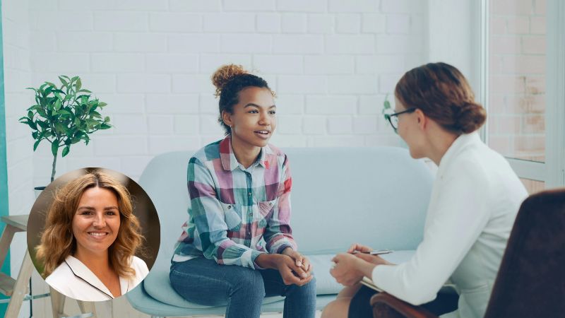 Therapist talking with a teenage girl during a counselling session, providing emotional support and mental health guidance.